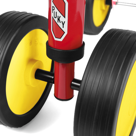 Jeździk rowerek czterokołowy Puky Pukylino jasnoszary z naklejkami i osłoną kierownicy