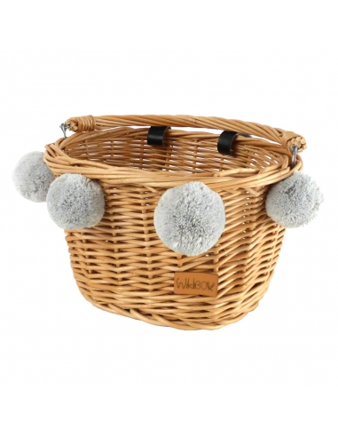Naturalny wiklinowy koszyk na rower dziecięcy, z szarymi pomponami (mocowany na paski)