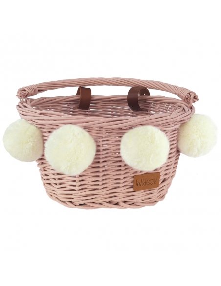 Różowy wiklinowy koszyk na rower dziecięcy, z kremowymi pomponami (mocowany na paski)