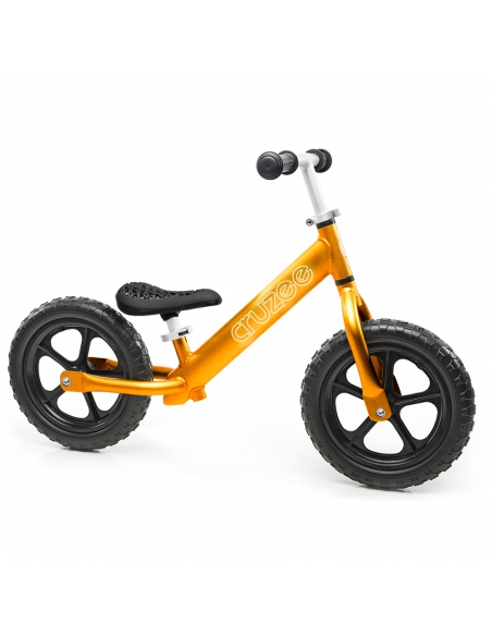 Rowerek biegowy Cruzee 12 złoty + pasek do noszenia GRATIS